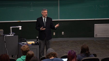 Interim President Patrick Phillips speaking to a class on the first day of fall term