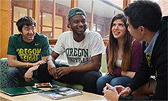 Students hanging out in a residence hall lounge