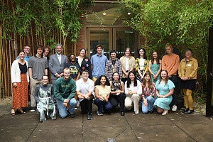 Clark Honors Students and Patrick Phillips pose for a group photo at the Stamps event.
